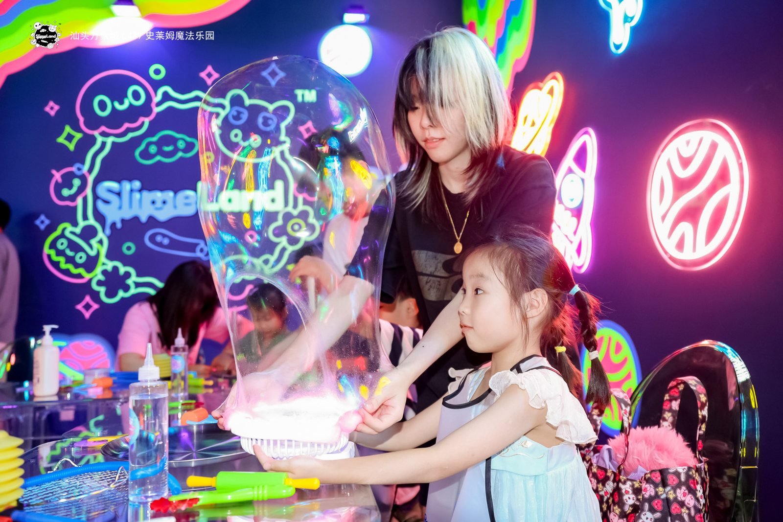 Luminous slime activity with glowing wall graphics
