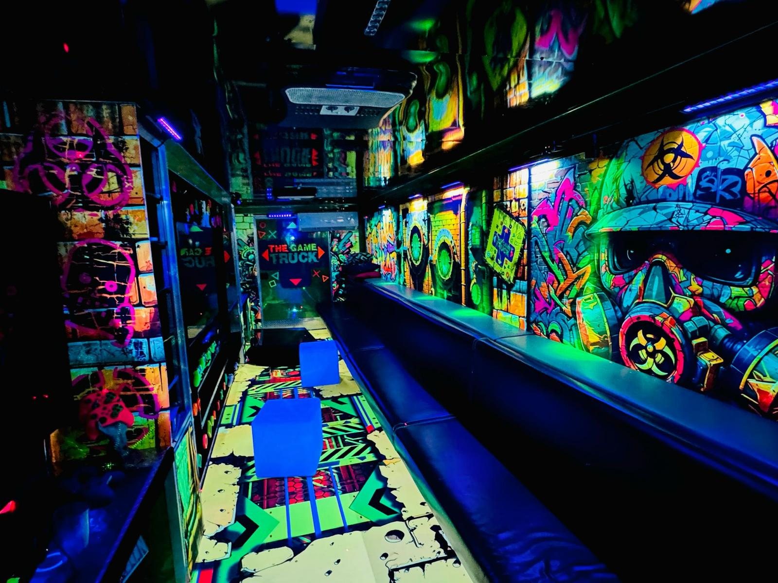 UV-reactive wallcovering and themed interior installation
